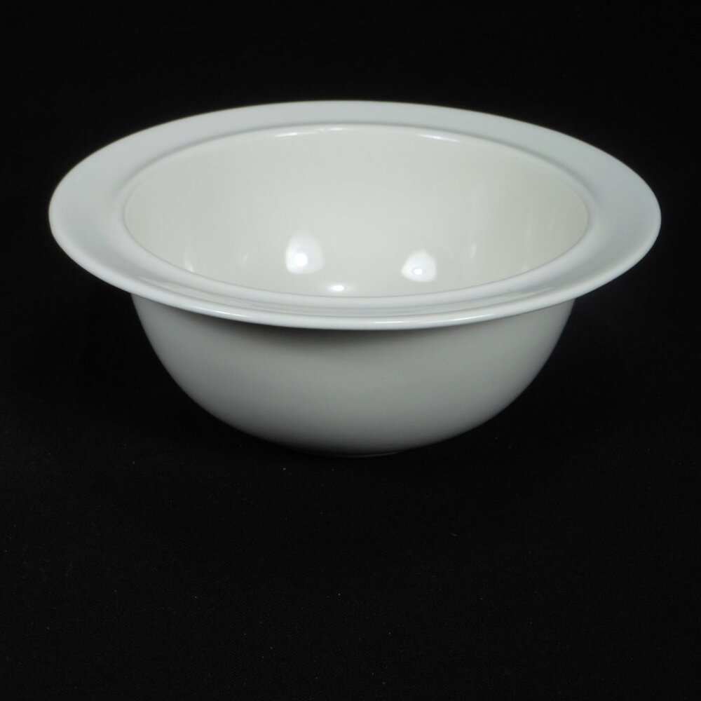 rimmed soup bowl. ALESSI ETTORE SOTTSASS